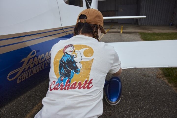 Carhartt Women's Loose Fit Heavyweight Short Sleeve Love Of Labor Graphic T-Shirt in Malt