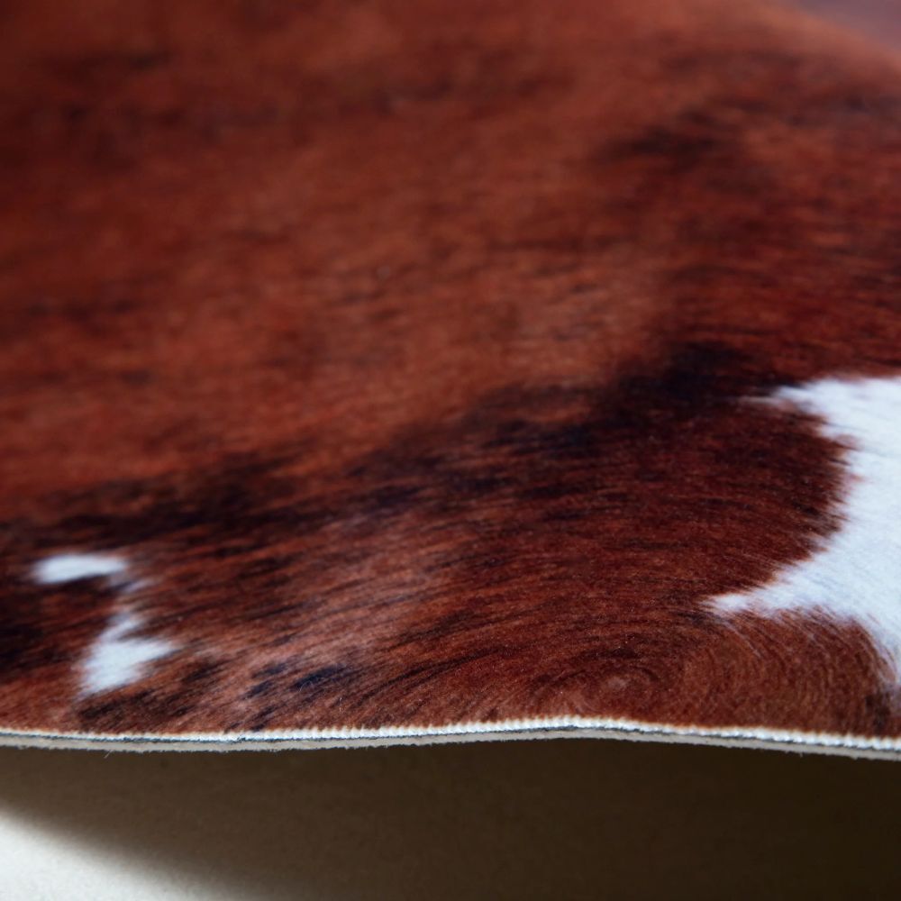 Carstens Small Faux Cowhide Print Rug, White Belly